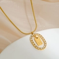 Golden snake chain necklace with oval diamond pendant and letter U engraving - Letter U