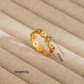 Detail view of gold-plated daisy ring showing 5.5mm width and enamel floral design - Gold Daisy Style (73)