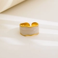 Detail of gold-plated wavy ring with marble texture enamel inlay and adjustable band - Wide Irregular Marble Pattern Design / Gold