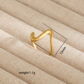 Detail view of irregular 18K gold-plated wave ring with 15mm height and 1.1g weight - Minimalist Wave Style (88)