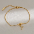 Minimalistische 18K gouden slangenarmband met hartknoop en een hanger met de letter Y - Letter Y