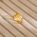 Detail shot of vintage style gold layered interlaced ring on beige fabric display - Gold Multi-Layer Interwoven Hollow Style (28)