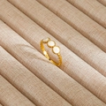 Detail of vintage gold ring with three white circular inlays and beaded edge accents - Gold Three White Circular Inlay Style (38)