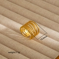 Detailed macro view of 18K gold plated spiral ring with matte sandblasted texture finish - Spiral Frosted Texture Style (95)