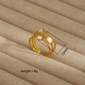 Detail view of 12mm wide irregular gold stainless steel ring with white square inlay - Three-Layer Wave White Square Style (121)