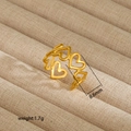 Macro shot of a hollow heart-shaped gold ring with 8.6mm width and adjustable band - Hollow Heart Style (207)
