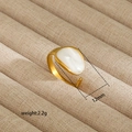 Detail of gold irregular ring featuring a mother-of-pearl stone inlay and sizing data - Mother of Pearl Veneer Style (221) / Gold