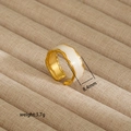 Detail of irregular 18K gold plated stainless steel ring with white enamel drips - Lava Flow Style (239) / Gold