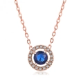Classic rose gold plated halo necklace featuring a round sapphire blue zircon pendant - Rose Gold Blue Zirconia