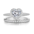 Macro shot of silver heart-shaped ring set with micro-paved cubic zirconia stones - 5 / Silver Plated White Zirconia