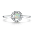 Macro shot of halo setting opal ring with white gold finish and sparkling zircon accents - Size 11 / 4mm Opal Round Ring