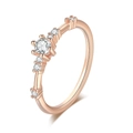 Elegant rose gold ring featuring a cluster of seven sparkling diamonds in a slim band - US 6 / Rose Gold Plated White Zirconia