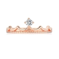 Macro detail of rose gold crown ring featuring a sparkling central zircon and bead edge - US 6 / Rose Gold