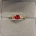Exquisite 14k gold plated ring featuring a ruby red oval zircon with clear side stones - US 5 / 14K Light Gold Red Stone