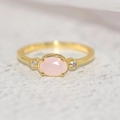 Elegant women's 14k gold plated ring featuring an oval pink gemstone and side zircons - US 6 / 14K Light Gold Pink Stone