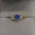 Elegant 14k gold plated ring with oval blue gemstone and tiny cubic zirconia accents - US 5 / 14K Light Gold Sapphire Blue