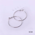 5CM silver polished hoop earrings with classic clasp closure on aesthetic background - 50MM Silver Post