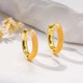 Elegant gold-plated hoop earrings with translucent orange acrylic and subtle glitter - Yellow