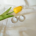Polished silver chunky hoop earrings with snap closure on a white fabric background - 3cm / Silver