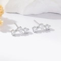 Macro detail of three circular cubic zirconia stones on S925 silver stud earrings - Silver White Zircon Studs