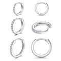 Ensemble de trois paires de créoles en argent serties de zircons de tailles variées - Argent