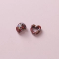 Detail of heart-shaped ceramic beads with multi-colored marble texture for DIY jewelry making - Red Blue White Yellow Mix (4#)