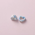 Close-up of heart-shaped ceramic beads with blue marble pattern and precision holes - Blue White Floral Pattern (15#)