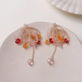 Champagne beaded tassel earrings with red floral accents and pink teardrop beads - Red