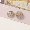 Detail of round resin charms with gold and silver foil and white dried flowers - No.6 White Dried Flower