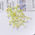 Handmade beaded tassel jewelry accessory with green, yellow, and white pearls in flower pattern - Light Green