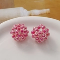 Close-up of handmade woven fuchsia acrylic beads for colorful sphere DIY jewelry - 1 Piece / Rose Red