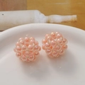 Detailed close-up of handmade iridescent pink acrylic bead spheres for DIY jewelry making - 1 Piece / Orange