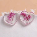 Detail of heart resin pendant with dried purple flowers and white pearls for DIY jewelry - Light Purple Dried Flower