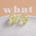Macro shot of two iridescent light yellow spiky sea urchin beads for jewelry DIY - Plated Yellow