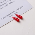 Detail shot of glossy red resin drop charms on a white decorative card for DIY earrings - 10# Red