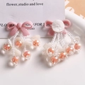 Handmade pink bow earrings with beaded tassels and white leaf charms for women - Orange Pink