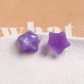Detail of purple star earrings with silver glitter and translucent resin finish - Purple