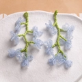 Handmade woven light blue flower earrings with green stems and glass seed beads - Light Blue