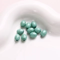 Primer plano de cuentas ovaladas turquesa con vetas marrones naturales para joyería DIY - Estilo Ovalado (126#) / 1 Pieza / Verde