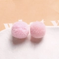 Close-up of soft 20mm light pink plush pom poms for DIY handmade jewelry crafts - Light Pink