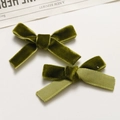 Close-up of vintage green velvet and ribbed ribbon handmade bow hair clips for women - Olive Green