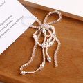 Fiocco intrecciato a mano con frange di perle bianche e perle di cristallo lucide - Bianco