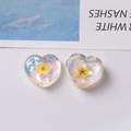 Heart-shaped resin charm with iridescent sequins and yellow dried flower detail - Yellow One Piece