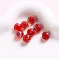 Makro-Detail von 10mm roten Glasperlen mit Herz- und Spiralmustern für DIY-Schmuck - Rote Herz-Rundperle (24#) / 1 Stück / Rot