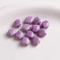 Macro shot of 12mm purple fan-shaped ceramic shell beads with pre-drilled holes for DIY - 1 Piece / Purple