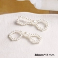 Dettaglio di fiocchi in perle fatti a mano per gioielli fai-da-te, misura 38mm x 11mm - Stile Fiocco Stretto (8#)