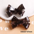 Pink floral bow hair clips in translucent resin with butterfly pattern, set of two pieces - Black Bow