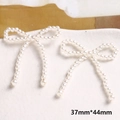 Dettaglio di accessori per gioielli fai-da-te a forma di fiocco di perle da 37mm x 44mm - Stile Fiocco Delicato (33#)