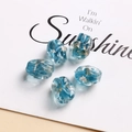 Detailed view of five blue handmade glass beads with gold foil for DIY jewelry making - 1 Piece / Sky Blue