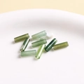 Macro view of natural green stone cylindrical beads with crackle textures for DIY jewelry - Cylinder Bead No. 22 / 1 Piece